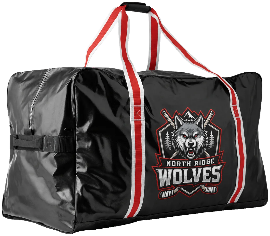 Black team equipment bag with red and white straps and a wolves crest